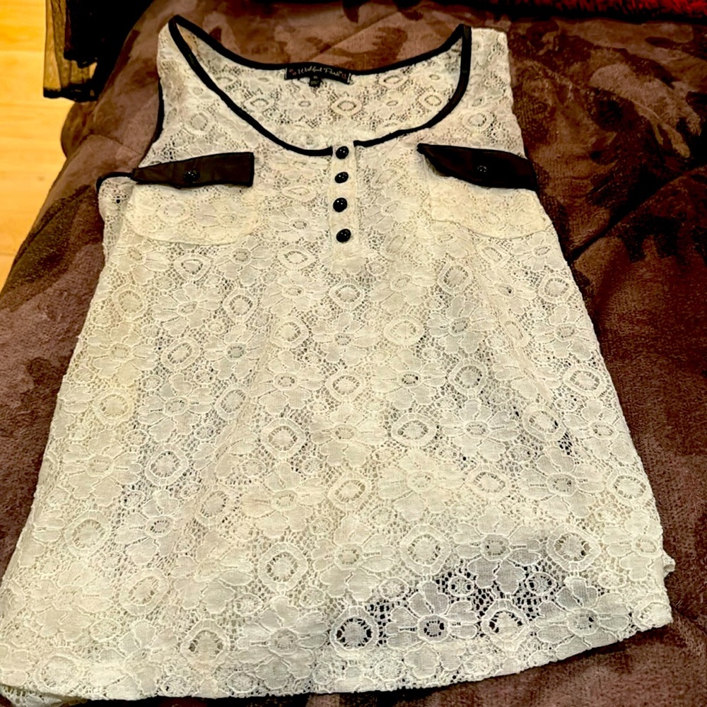 Never worn but tags off. No longer fits style